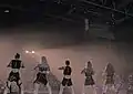 (G)I-dle in all-black outfits for the theme HEROiNE: Cliché.