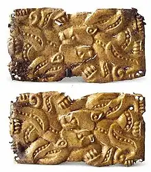 Gold belt plaques in animal style found in Majiayuan M4, Gansu.