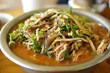 Jari mulhoe, mulhoe (sliced raw fish with a mixture of water and spice sauce), made with Damselfish (Chromis notata).