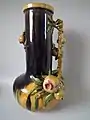 Pomegranate Vase, 1878, 22 ins., coloured glazes, boldly decorative, naturalistic and humorous in style.