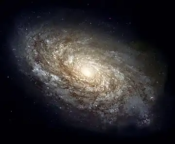 Image 21NGC 4414Photograph: Hubble Heritage Team (AURA/STScI/NASA)NGC 4414 is an unbarred spiral galaxy about 62 million light-years away in the constellation Coma Berenices. It is a flocculent spiral galaxy, with short segments of spiral structure but without the dramatic well-defined spiral arms of a grand design spiral. NGC 4414 is a very isolated galaxy, with no signs of past interactions with other galaxies.More selected pictures