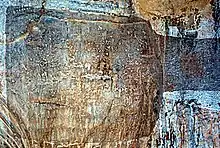 Parthian (above), along with Greek (below) versions of Shapur inscription in Naqsh-e Rajab