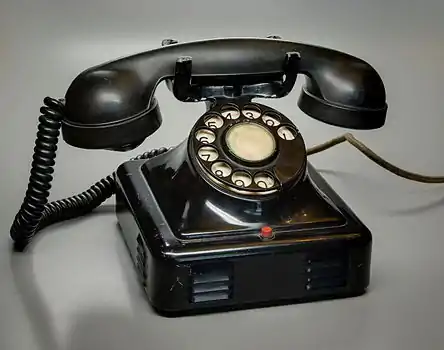 Image 4Rotary dial telephone, probably from Belgium; the circuit diagram inside is in Dutch and French