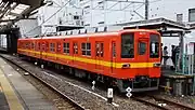 Orange-liveried 8000 series set 8577 in April 2016