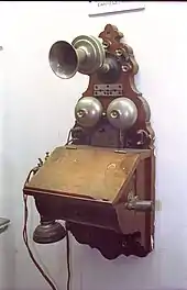 Image 17Wooden wall telephone with a hand-cranked magneto generator